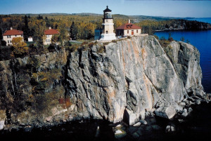 The Split Rock Light stands guard on a rocky headland of Lake Superior's North Shore, warning ships away from dangerous waters.  (Photo Dennis Adams)