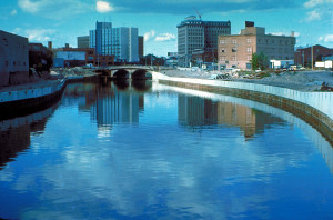 The Flint River, Michigan, under a floodwall lock and key in downtown. Photo US Army Corps of Engineers 1979.
